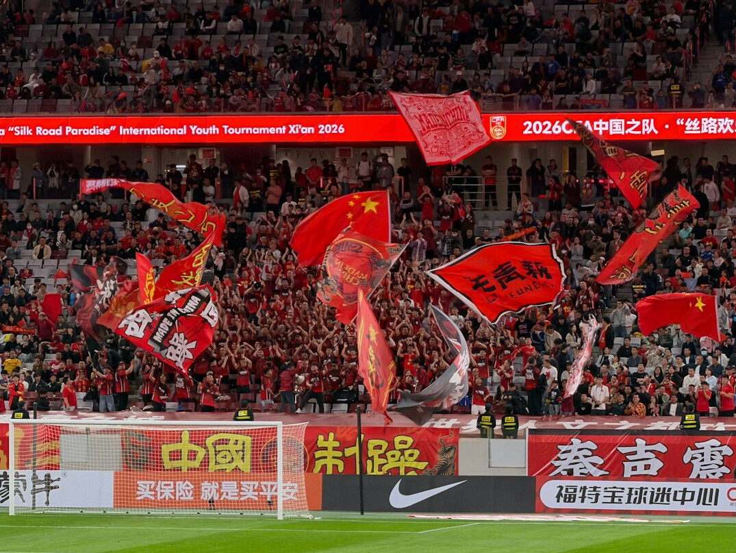 Football stadium filled with fans celebrating