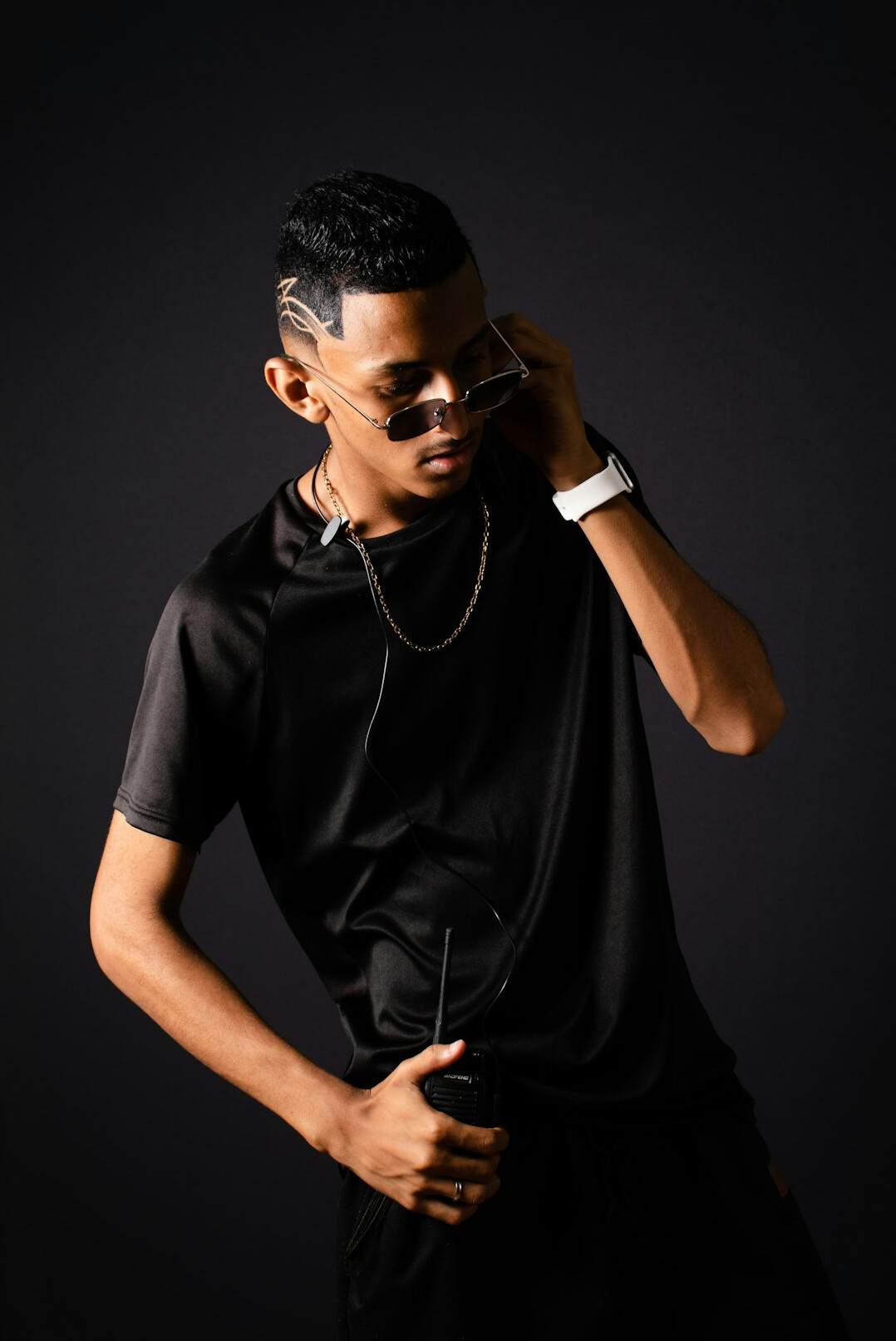 Studio portrait of a professional Latino man editor