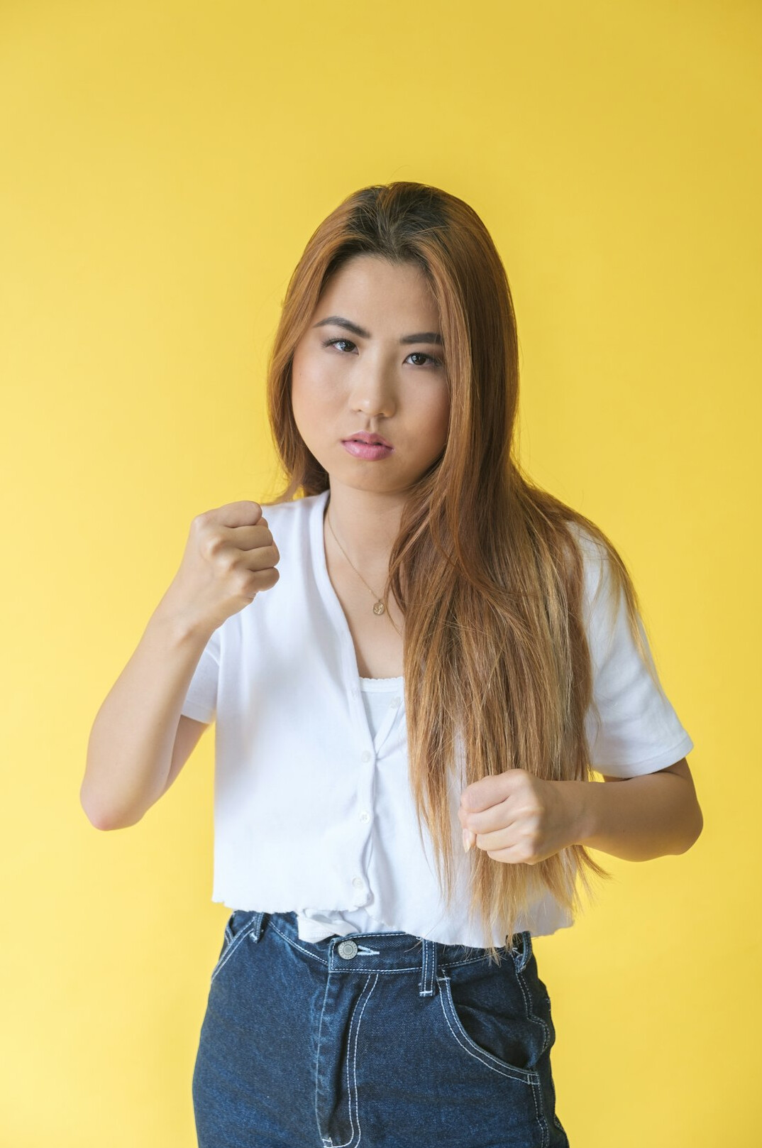 Studio portrait of a professional young Latina woman reporter