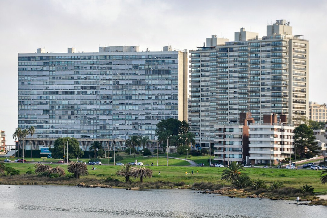 Skyline of Montevideo at dusk with waterfront buildings