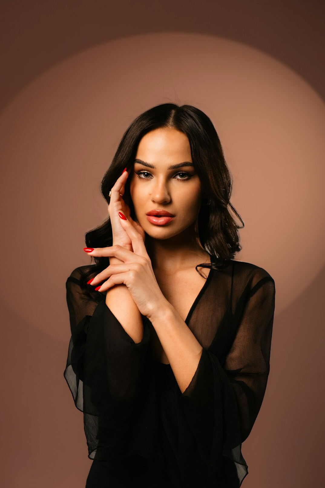 Studio portrait of a professional Latina woman journalist