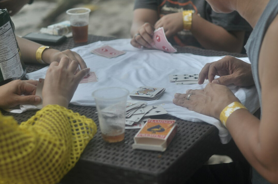 Marketing team discussing an advertising campaign around a table