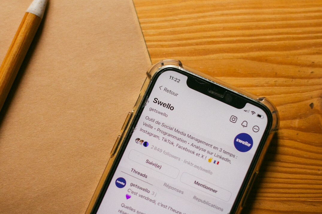 Smartphone displaying an email newsletter inbox