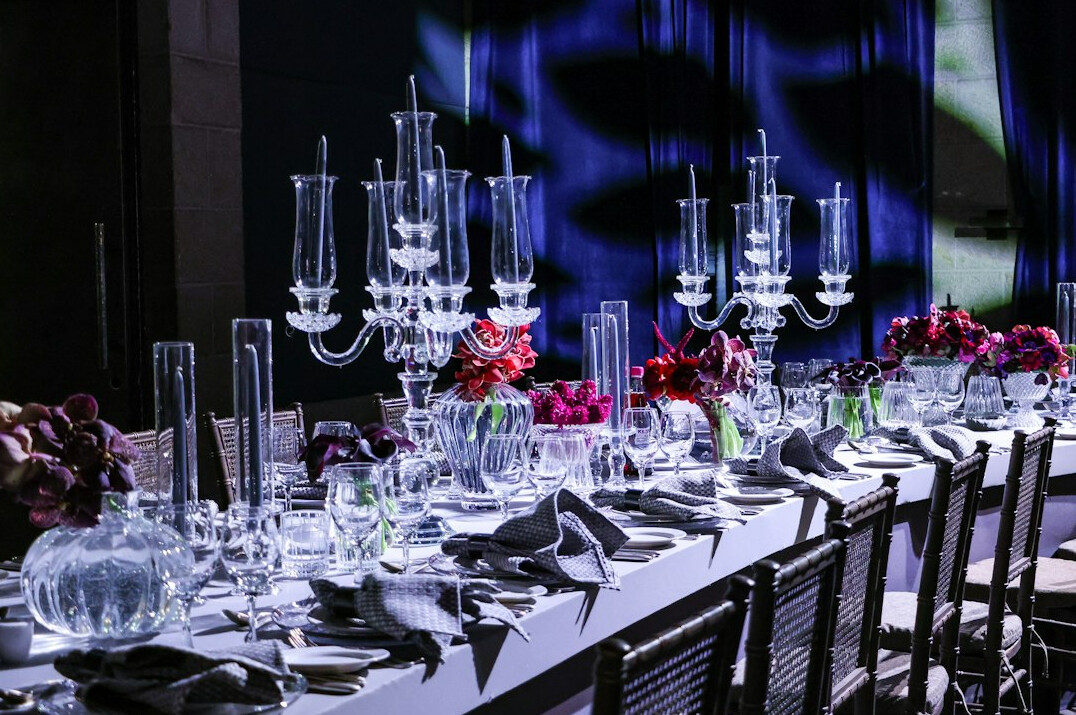 Elegant fashion gala table setting with soft lighting